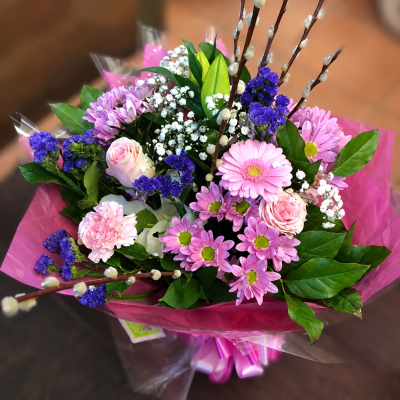 Violet Kiss - A cheerful pink and purple bouquet with soft romantic tones, fresh greenery and delicate white accents.
